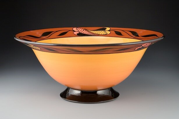 Marti Mocahbee creates clay teapots, bowls, cups and saucers, plates, vases and lidded jars inspired by cultural and historical influences, color and form.