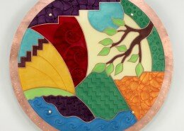 Deana Blanchard & Chuck Young, mixed media artists, work out of their studio Selena Glass & Metal in Burnsville, NC creating colorful metal and glass art.