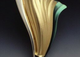 Betty Helen Longhi, jeweler in Lexington, NC, creates earrings, necklaces, pins & pendants from 18K gold, sterling silver & niobium to add rich jewel tones.