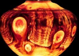 Billy Hall, woodworker in Durham, North Carolina creates glowing wood sculptures and lamps reveling the transcendent beauty of swirling wood grain patterns.