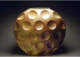 John Ransmeier, Asheville, NC Ceramic Artist, combines wheel thrown, pressed, slab and coil construction for his wood fired, functional or sculptural works.