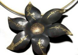 Jody Ochs, Jeweler in Western NC, creates elegant hand forged and fabricated jewelry in sterling silver, high karat gold bezels, gem stones and pearls.