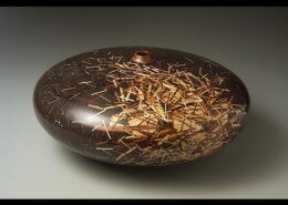 James Barnes, woodworker in Woolwine, Virginia, creates turned wood vessels with inlay and metal to design original, one-of-a-kind wood cloisonné sculpture.