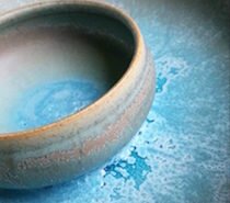 Delores Hayes, potter in Durham, NC, creates functional and decorative ceramic wares on a potters wheel.